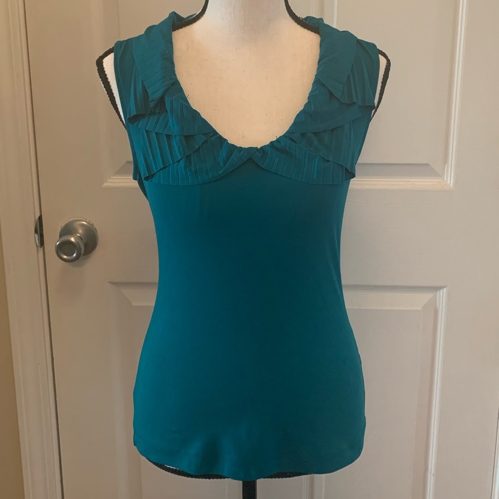 Teal sleeveless blouse
